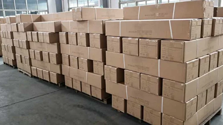 Finished car roof rack cartons stacked in factory finished goods warehouse